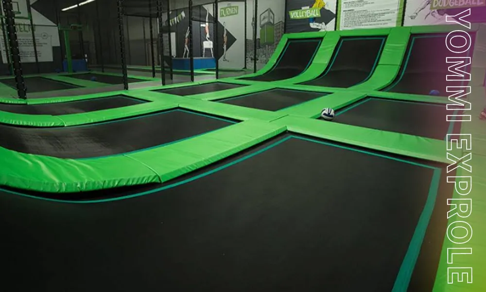 Standard commercial trampoline park jump area strictly engineered to fit within a baseline 5-meter clear height building requirement.