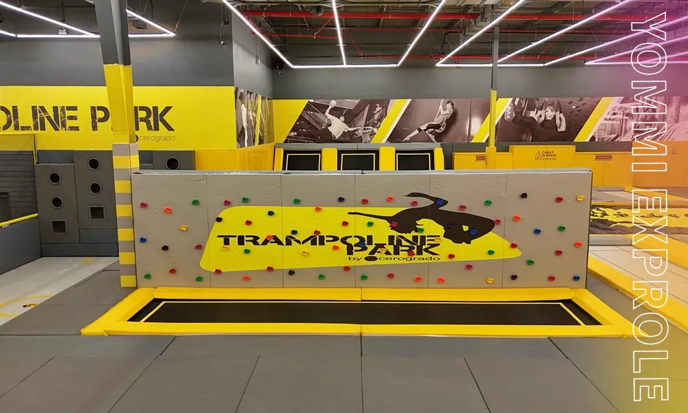 Interactive trampoline climbing game installed in a commercial trampoline park to increase customer retention and diversify revenue streams.