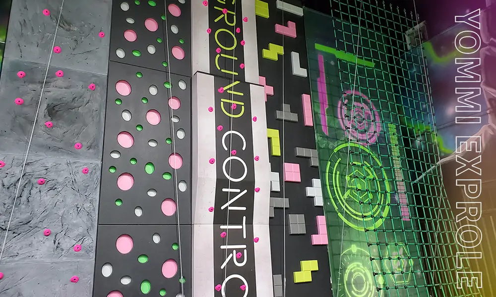 Interactive scoring climbing walls used for corporate team building and target management drills.