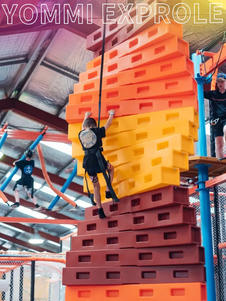 High-capacity trampoline climbing arena designed for adult corporate team-building events and high throughput.