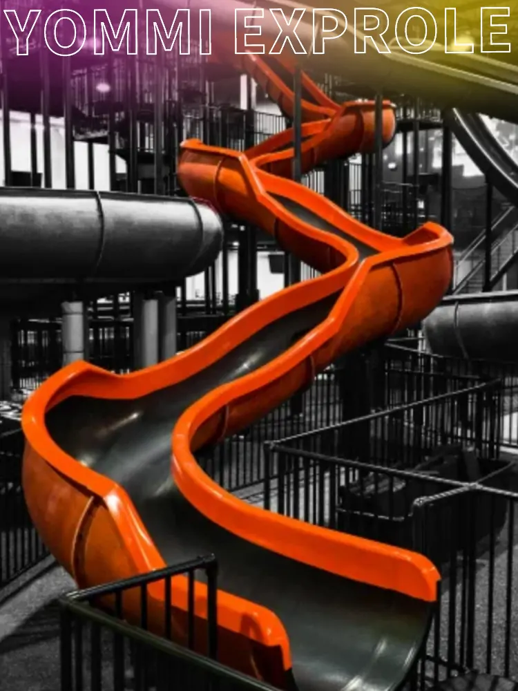 Black & Gold Industrial neon-lit Ninja Course engineered for adult stress resistance training and corporate events.