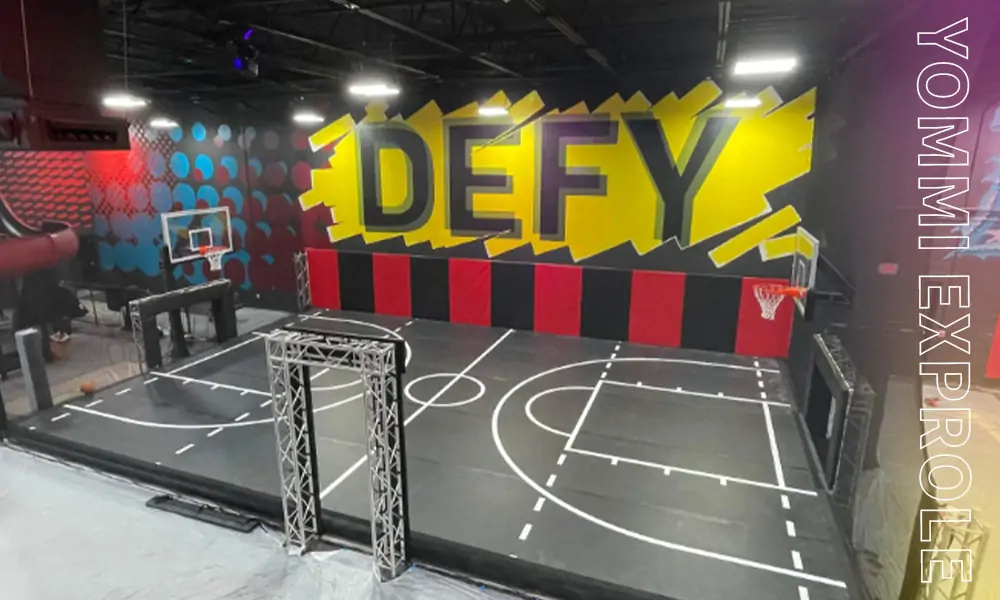 Premium black and industrial style indoor trampoline basketball court for adult competition.