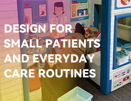 This wide-format banner image features a medical-themed indoor play area, prominently displaying the text 