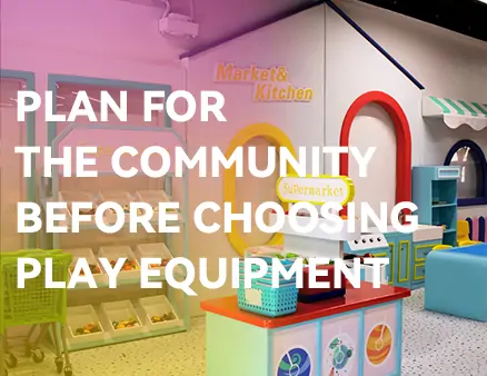 Wide‑format banner of colorful indoor supermarket & kitchen role‑play area, text: Plan for the community before choosing play equipment, community playground public‑service design principle